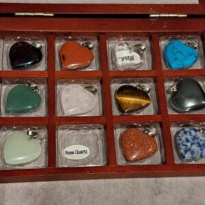 11 heart gem stone pendants in wooden case